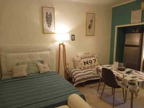 Ένα ή περισσότερα κρεβάτια σε δωμάτιο στο Sol