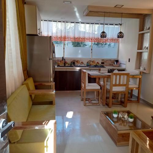 Photo de la galerie de l'établissement Departamento de 2 dormitorios en la Victoria, cerca de las Universidades con garaje gratis, à Ibarra