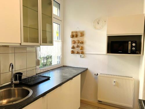 Η κουζίνα ή μικρή κουζίνα στο Pension Kaditz