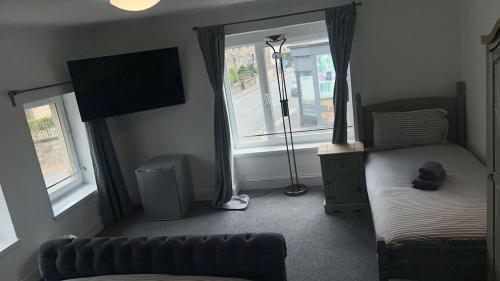 Postel nebo postele na pokoji v ubytování Whole property in Kirkcaldy Fife