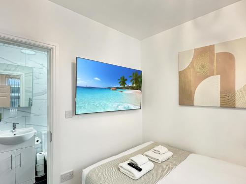 Ένα μπάνιο στο Granada Apartments Derby Road