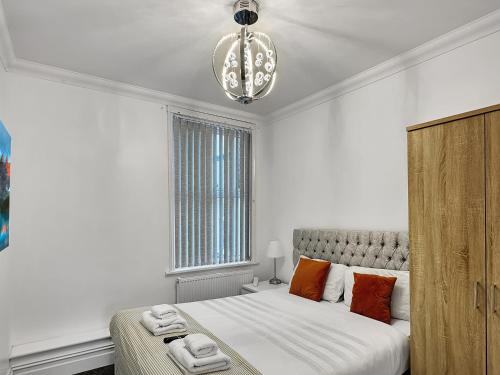 Ένα ή περισσότερα κρεβάτια σε δωμάτιο στο Granada Apartments Derby Road