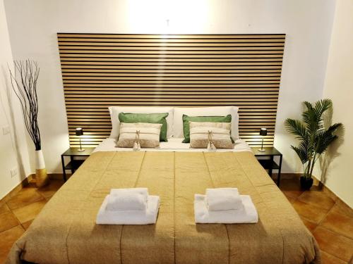 Cama o camas de una habitación en La Magia del Borgo