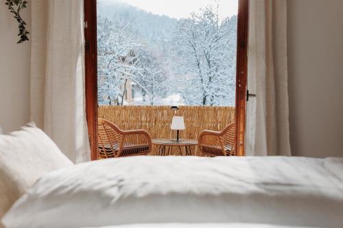 Voodi või voodid majutusasutuse Ferienwohnung Alpenperle toas