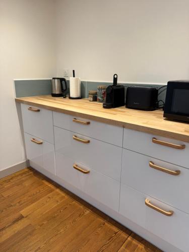 Cuisine ou kitchenette dans l'établissement OHANA Appartement de charme