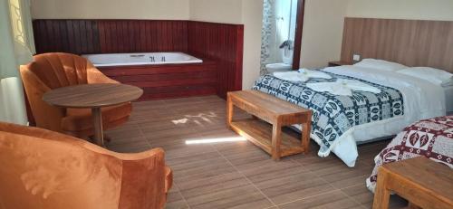 Postel nebo postele na pokoji v ubytování Pousada café em Flor