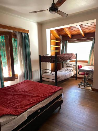 En eller flere senge i et værelse på perfecta casa en Cordoba