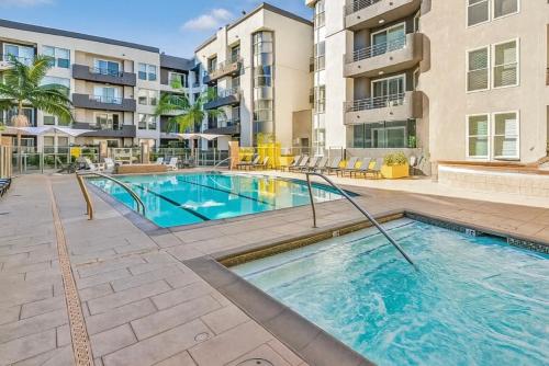 an image of a swimming pool at a apartment complex at Spacious 3-Bedroom 3BTH Apt in Marina Del Rey! Pool, Hot Tub in Los Angeles