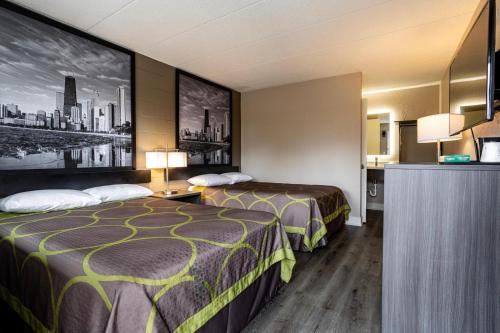 Voodi või voodid majutusasutuse Super 8 by Wyndham Rockford South toas