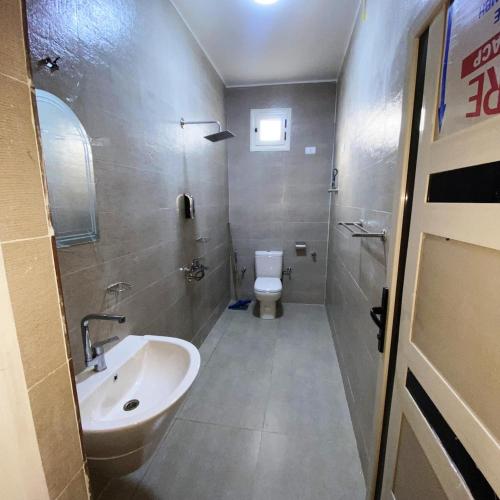 a bathroom with a sink and a toilet at nubian yellow desert in Aswan