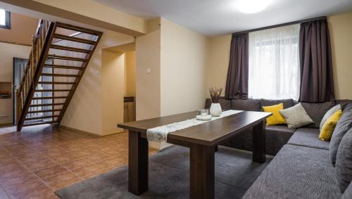 Posezení v ubytování Guest House Intrigue
