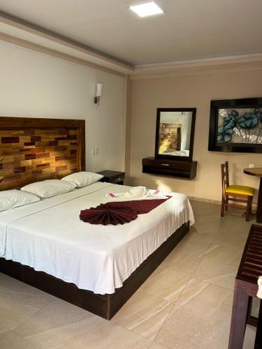 Postel nebo postele na pokoji v ubytování Hotel Framfor Inn Chetumal