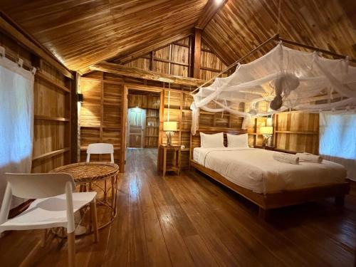 Postel nebo postele na pokoji v ubytování Sook Village