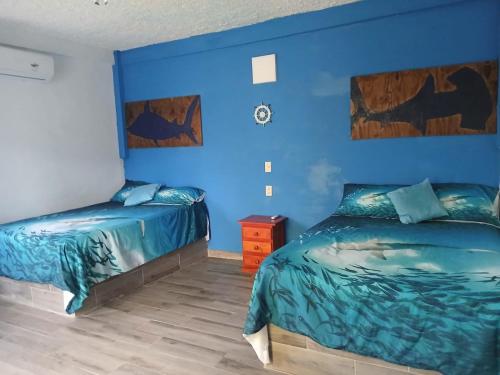 Ένα ή περισσότερα κρεβάτια σε δωμάτιο στο Hostal