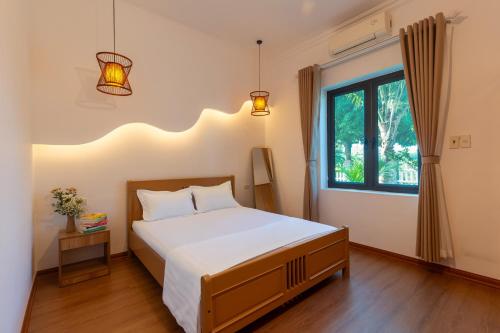 Postel nebo postele na pokoji v ubytování Sol Flow Retreat