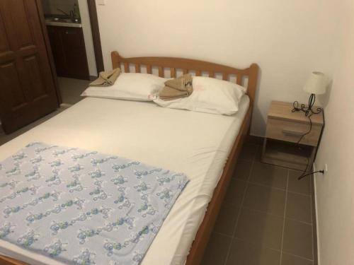 Postel nebo postele na pokoji v ubytování Apartmani Villa Borzic - One Bedroom Apt with Terarce & Sea View