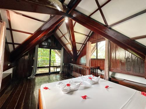 En eller flere senge i et værelse på Ocean 202 Homestay