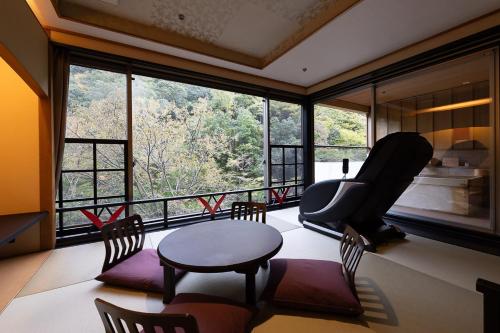 Posezení v ubytování Okudogo Ichiyunomori