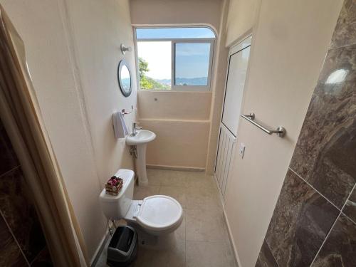 Koupelna v ubytování Acogedor departamento con vista al mar