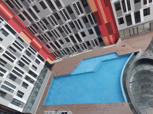 Πισίνα στο ή κοντά στο Unit Alton Undip Tembalang by SAJI Rooms