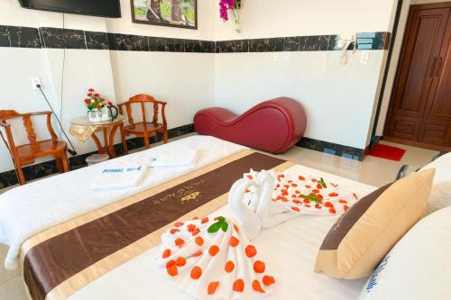 Ένα ή περισσότερα κρεβάτια σε δωμάτιο στο Phương Anh 9 Hotel