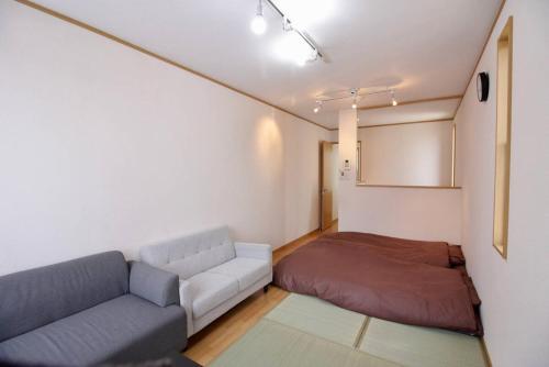 Χώρος καθιστικού στο a1テラス付き1SLDKメゾネット駐車場あり東京都羽村市