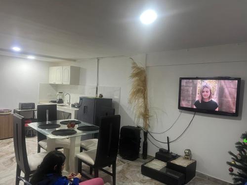 TV a/nebo společenská místnost v ubytování Casa Linda