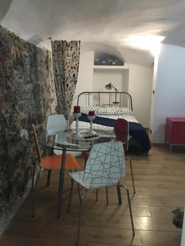Una cama o camas en una habitación de Le Grazie Maisons Genova