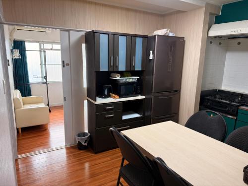 Nhà bếp/bếp nhỏ tại SUN PALACE Fussa