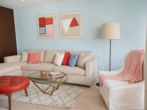 a living room with a couch and a table at Art District Downtown Spacious Homes in Los Angeles