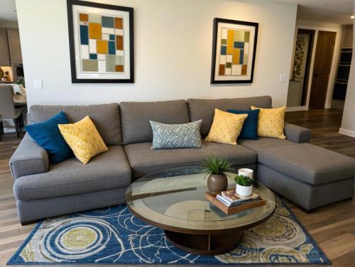 a living room with a couch and a coffee table at Art District Downtown Spacious Homes in Los Angeles