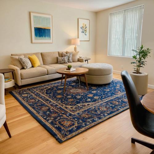 a living room with a couch and a table at Art District Downtown Spacious Homes in Los Angeles
