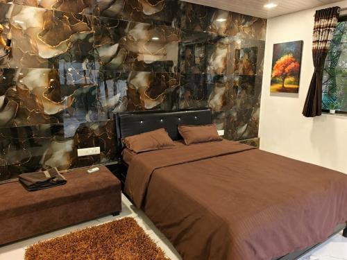 Giường trong phòng chung tại Mountain Bliss