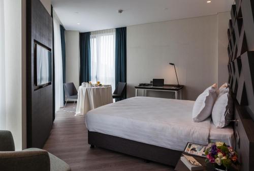 Postel nebo postele na pokoji v ubytování Wish More Hotel Istanbul