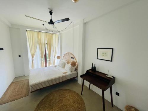 Ένα ή περισσότερα κρεβάτια σε δωμάτιο στο Ahangama Surf Club