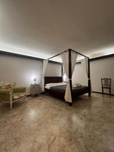 Ένα ή περισσότερα κρεβάτια σε δωμάτιο στο Al Castello