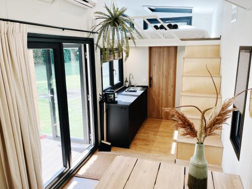 Kuchyň nebo kuchyňský kout v ubytování Tiny House met privé hottub