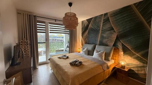 Ένα ή περισσότερα κρεβάτια σε δωμάτιο στο Apartmán v meste Bratislava