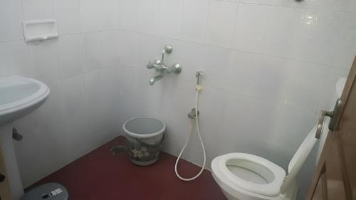 Koupelna v ubytování Raaha Luxury Home Stay