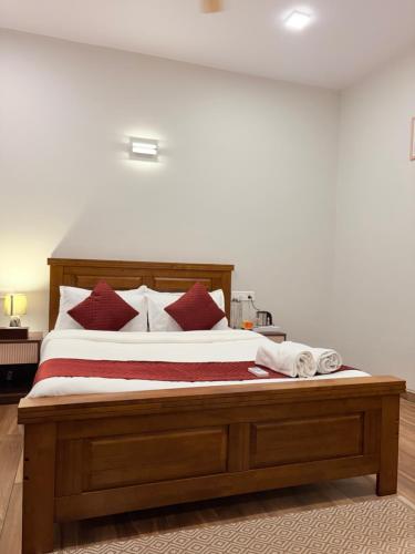 Postel nebo postele na pokoji v ubytování 3 BHK Irene Villa with Jacuzzi pool by Asmeera Stays