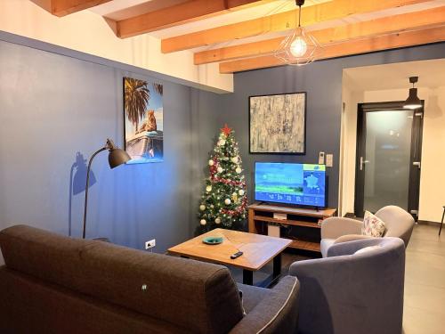 Μια τηλεόραση ή/και κέντρο ψυχαγωγίας στο Sweet Escape et Spa