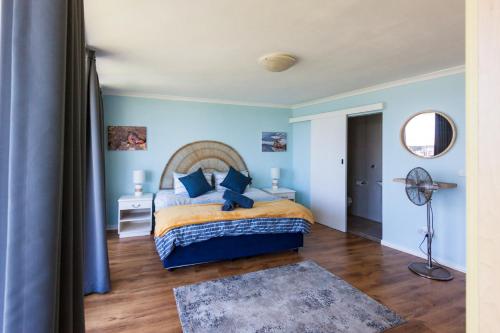 Ένα ή περισσότερα κρεβάτια σε δωμάτιο στο Jeffreys Bay Getaway