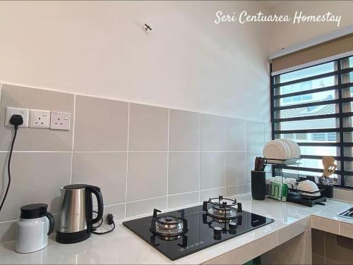Køkken eller tekøkken på Seri Centuarea Homestay, Seri Iskandar