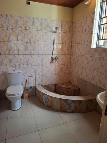 Ένα μπάνιο στο Kigali Great Home