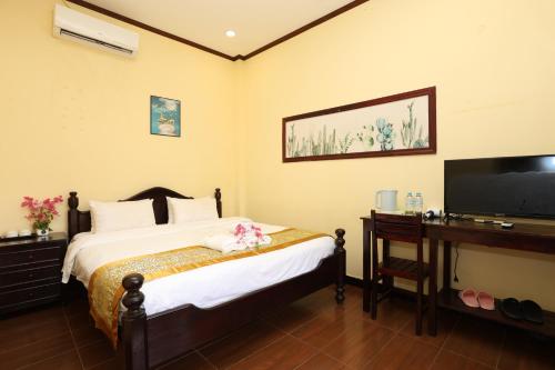 Postel nebo postele na pokoji v ubytování We House River View