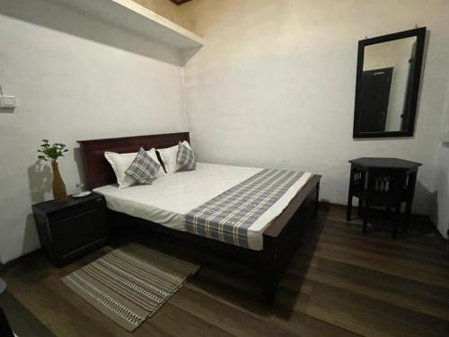 Ένα ή περισσότερα κρεβάτια σε δωμάτιο στο Serene Garden Lodge