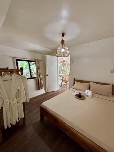 Postel nebo postele na pokoji v ubytování Bundal Riverside