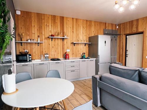 Η κουζίνα ή μικρή κουζίνα στο AlmaHouse Secluded Mountain Cabins