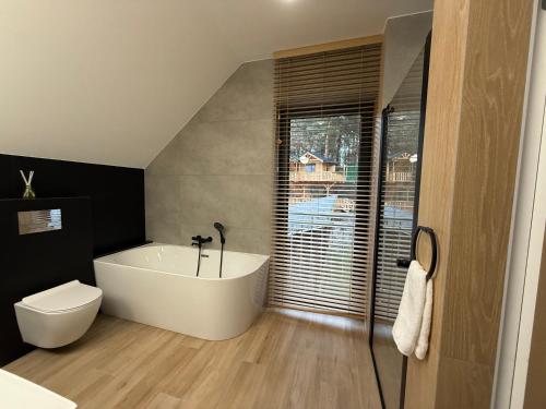 Et badeværelse på Szumy Villas - Roztocze Huta Szumy