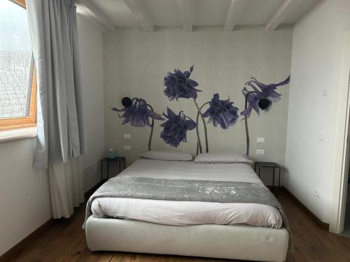 Postel nebo postele na pokoji v ubytování Agriturismo Maso San Valentino